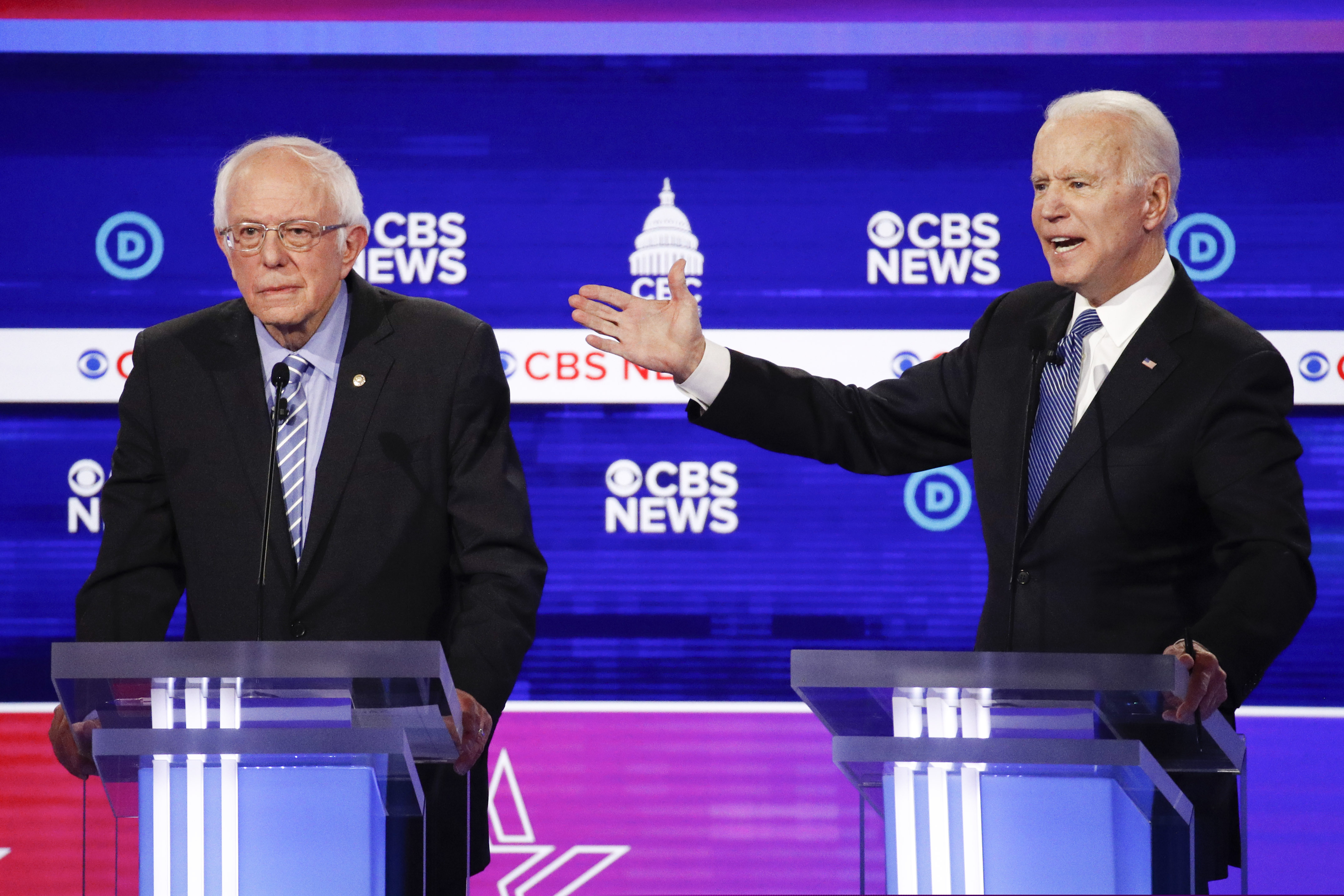 Democratic presidential candidates, Sen. Bernie Sanders, I-Vt., left, and former Vice President Joe Biden, right, participate in a Democratic presidential primary debate at the Gaillard Center, Tuesday, Feb. 25, 2020, in Charleston, S.C., co-hosted by CBS News and the Congressional Black Caucus Institute. (AP Photo/Patrick Semansky)