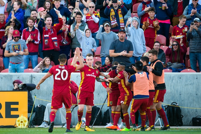 (Chris Detrick  |  The Salt Lake Tribune)  Real Salt Lake forward Brooks Lennon (27) celebrates with Real Salt Lake midfielder Luis Silva (20) after scoring a goal past Sporting Kansas City goalkeeper Andrew Dykstra (21) during the game at Rio Tinto Stadium Sunday, October 22, 2017.  