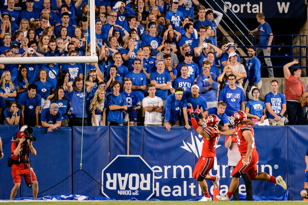 (Trent Nelson | The Salt Lake Tribune)
Utah Utes linebacker Francis Bernard (13) makes a U sign to BYU Fans after scoring on an interception, as Brigham Young University (BYU) hosts the University of Utah, NCAA football in Provo on Thursday Aug. 29, 2019.