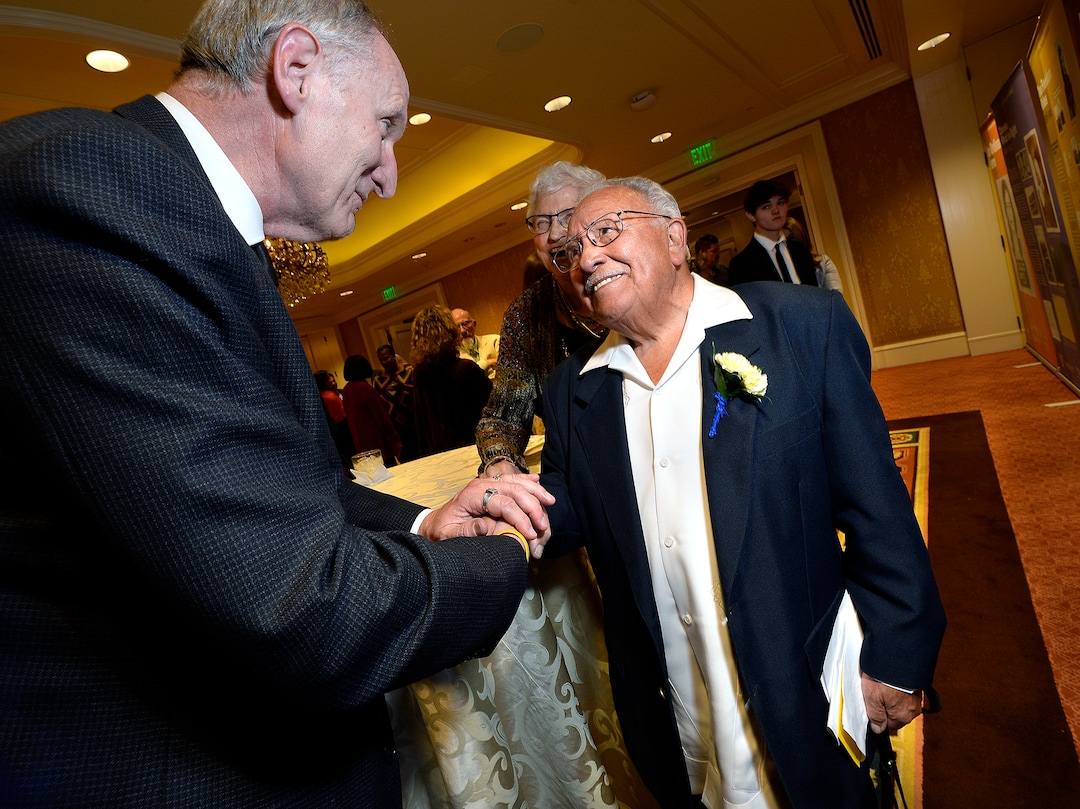 (Scott Sommerdorf   |  The Salt Lake Tribune)   Tim Chambless of the Hinckley Institute, left, congratulates Latino activist, and civil rights advocate Robert "Archie" Archuleta prior to his being presented with the Albert Fritz Civil Rights Worker of the Year Award, by the Salt Lake branch of the NAACP, Friday, October 27, 2017. 