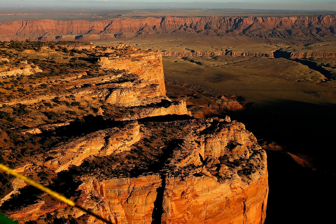 (Chris Detrick  |  Tribune File Photo)  The Two mile ranch is one top of the Vermilion Cliffs, to the left, overlooking the Kane Ranch below.