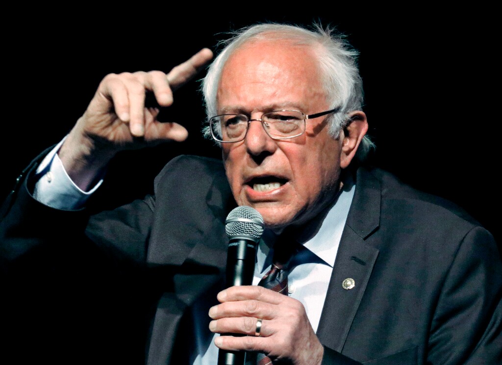 FILE - In this April 4, 2018, file photo, Sen. Bernie Sanders, I-Vt., responds to a question during a town hall meeting in Jackson, Miss. Sanders’ “Medicare for all” plan would increase government health care spending by $32.6 trillion over 10 years, according to a study by a university-based libertarian policy center. (AP Photo/Rogelio V. Solis, File)