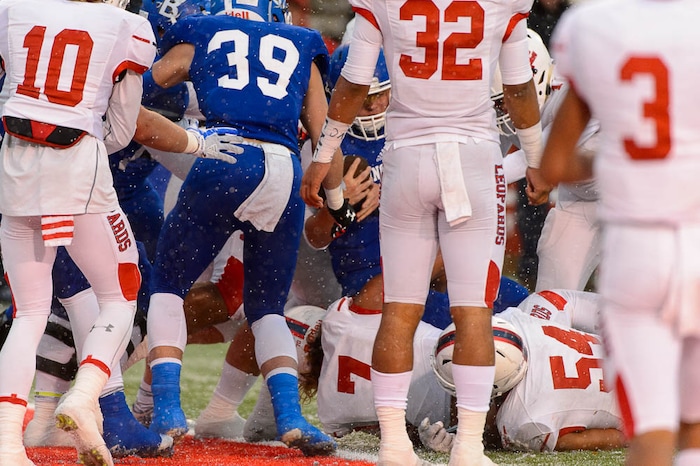 (Trent Nelson | The Salt Lake Tribune)  Bingham's Ryan Wood (2) scores a touchdown as Bingham defeats East in the Class 6A High School State Football Championship game in Salt Lake City, Friday November 17, 2017.