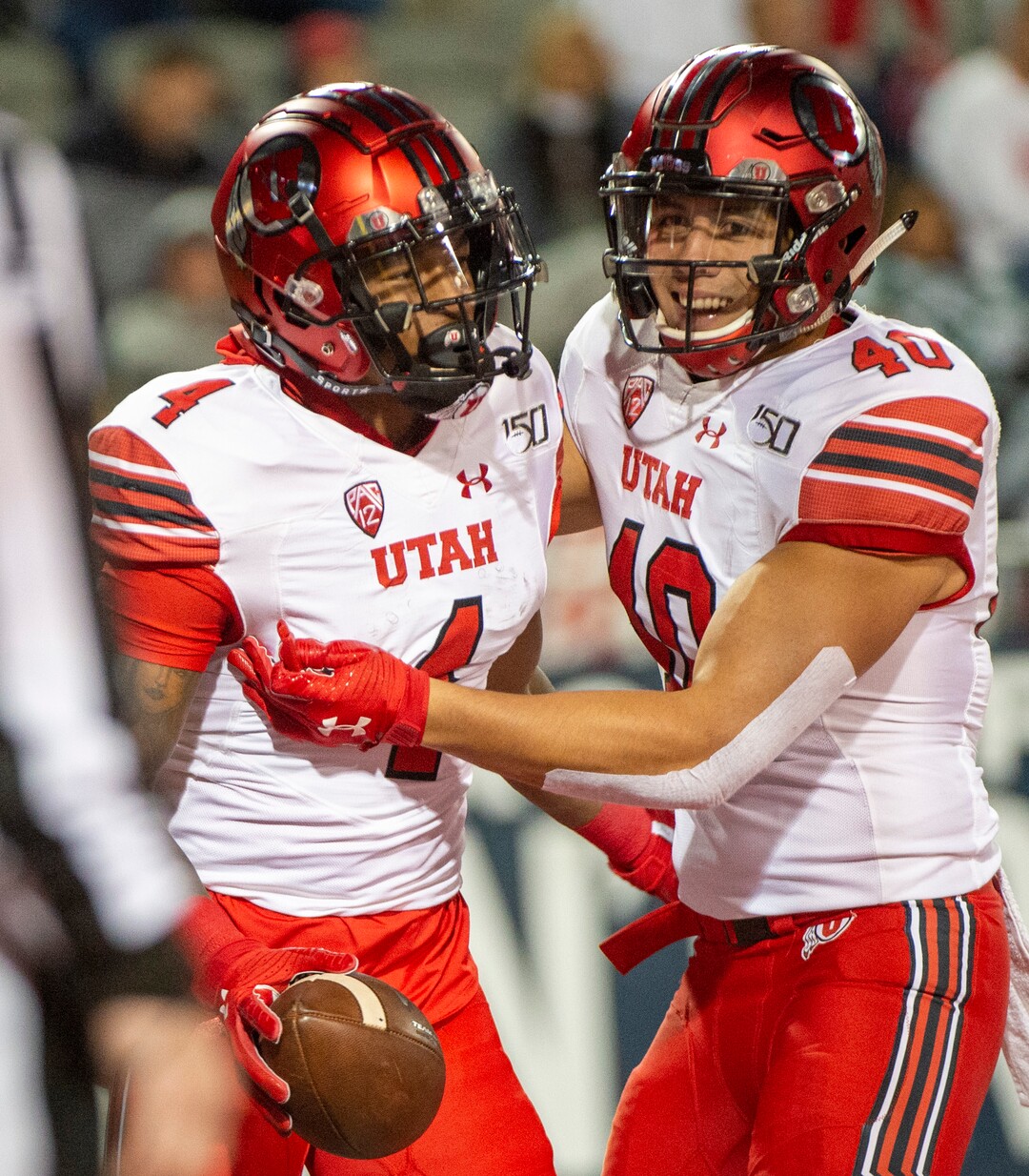 (Rick Egan  |  The Salt Lake Tribune)      Utah Utes tight end Ali'i Niumatalolo (40) congratulates Utah Utes running back TJ Green (4) after he scored a touchdown, in PAC-12 action between the Utah Utes and the Arizona Wildcats in Tucson, Saturday, Nov. 23, 2019.