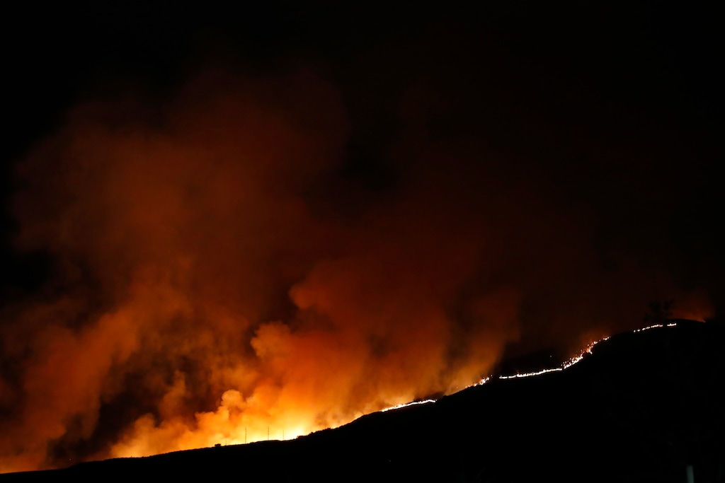 (George Frey | Special to The Tribune) A wildfire burns on Traverse Mountain above Lehi on June 28th, 2020. On Sunday, the National Weather Service issued its first “red flag” fire warnings of 2021, for parts of the Uinta Basin.