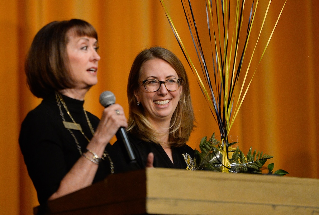 (Francisco Kjolseth | Tribune file photo) Sydnee Dickson, State Superintendent of Public Instruction, left, presents Cottonwood High School English teacher Lauren Merkley, as this year's teacher of the year ahead of the schools big pep rally on Friday, Sept. 6, 2019.