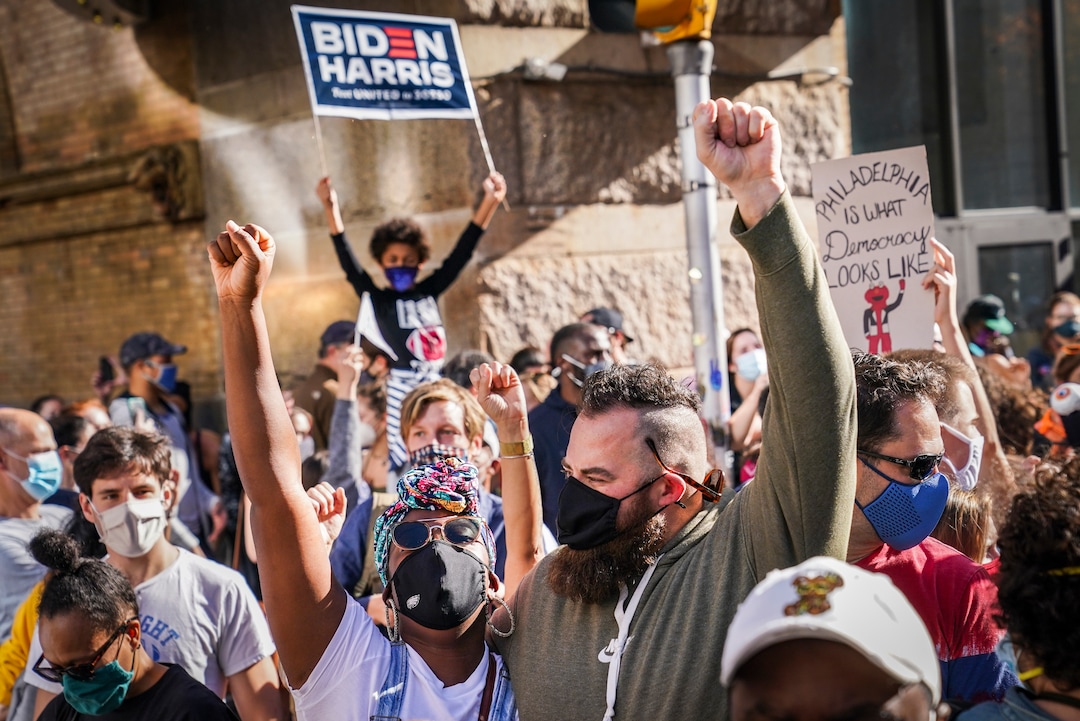 Demonstrators celebrate after the 2020 presidential election is called for President-elect Joe Biden, Saturday, Nov. 7, 2020, in Philadelphia. (AP Photo/John Minchillo)