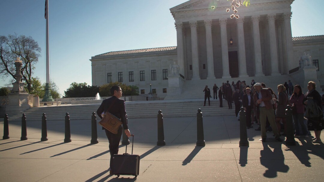 (Sean McGing  |  courtesy of Sundance institute) An ACLU lawyer walks toward the U.S. Supreme Court, in a scene from "The Fight," directed by Elyse Steinberg, Josh Kriegman and Eli Despres, an official selection of the U.S. Documentary Competition at the 2020 Sundance Film Festival.