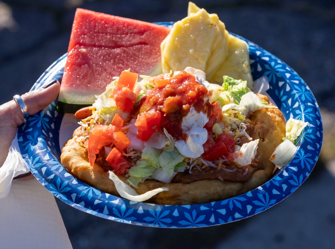 (Rick Egan | The Salt Lake Tribune) Dave John cooks up some meat for Navajo Tacos, as he teams up with Black Lives for Humanity to serve a "Gratitude Dinner" to more than 100 people from the unsheltered population, on 500 West in Salt Lake City, onThursday, Nov. 25, 2021.