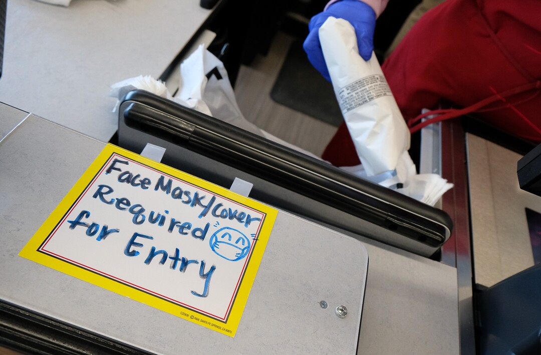 (Francisco Kjolseth  |  The Salt Lake Tribune) A steady stream of customers visits Snider Brothers Meats in Cottonwood Heights on Tuesday, May 5, 2020, where owners Will and Amy Wilson, have been requiring that all customers wear masks or facial coverings when they come to shop.