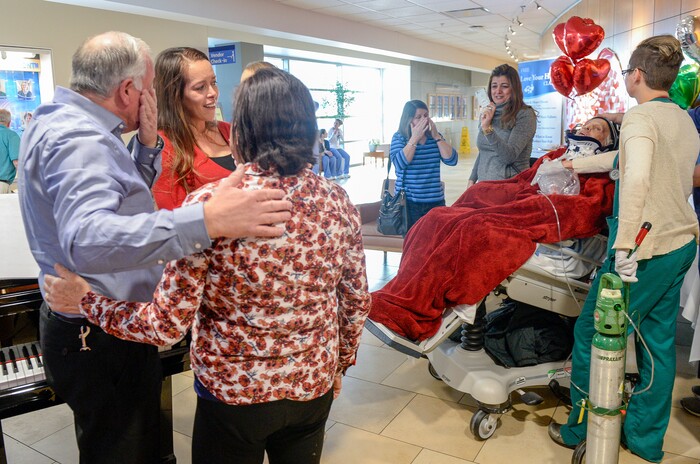 Leah Hogsten  |  The Salt Lake Tribune  l-r Church of Jesus Christ of Latter-day Saints bishop, Bispo Do Pai Valdir embraces Lucia Silva and her daughter Flavia Beare after Valdir played the piano for his friend Osvaldo Silva. On Friday, Intermountain Hospital caregivers wheeled paralyzed cancer patient Osvaldo Silva, 85, down to the lobby for a personal piano concert in his honor, Feb. 15, 2019. With tears streaming down his face, Osvaldo, who is from Brazil, was treated to a dozen songs played by his Church of Jesus Christ of Latter-day Saints bishop, Bispo Do Pai Valdir, who kicked off the set with none other than ÒThe Girl from Ipanema.Ó  