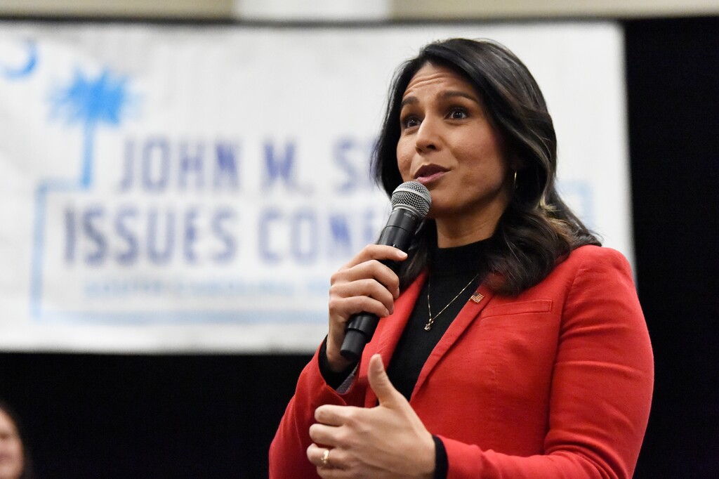 (Meg Kinnard/The Associated Press)
Democratic presidential candidate U.S. Rep. Tulsi Gabbard, D-Hawaii speaks to Democrats gathered at the Spratt Issues Conference in Greenville, S.C., Saturday, Dec. 14, 2019. Gabbard did not support the impeachment of President Donald Trump, voting "present" on two articles that passed the House on Wednesday night.