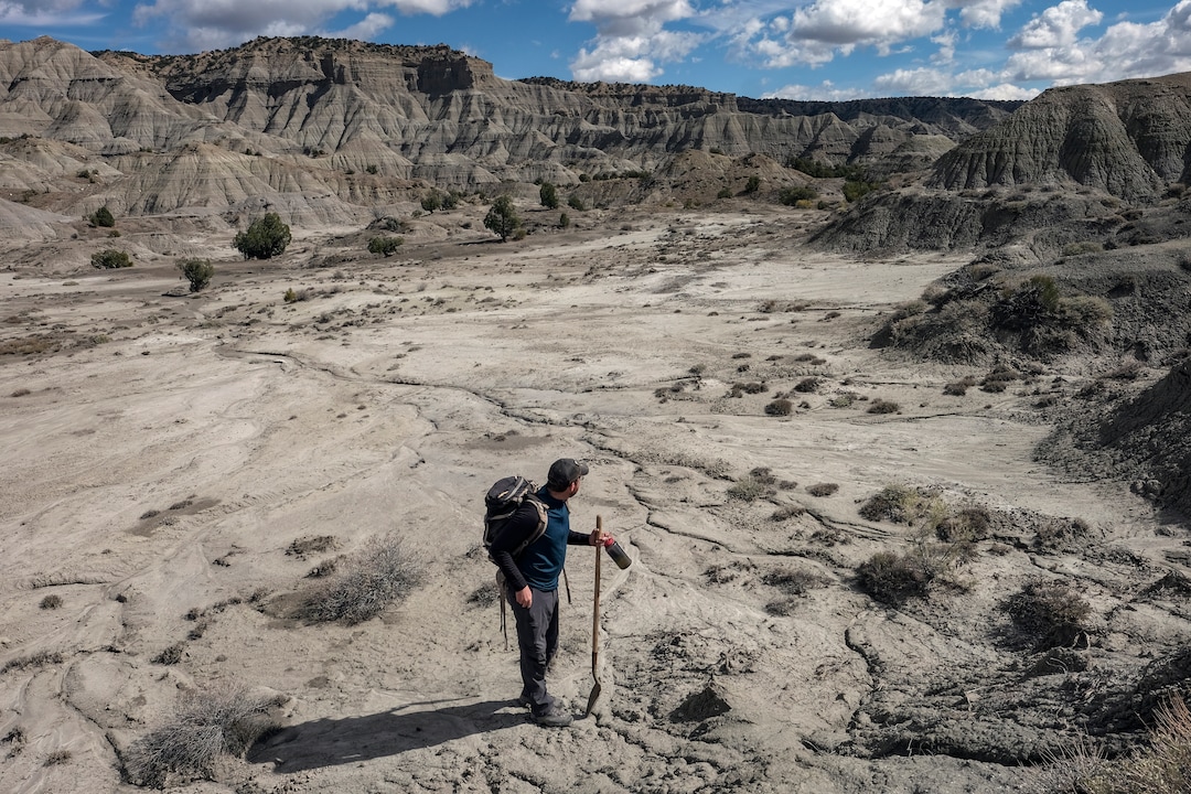 (Bonnie Jo Mount | The Washington Post) Paleontologist Randy Irmis makes his way to a newly discovered dinosaur site in Grand Staircase-Escalante National Monument in UtahOctober 2018.