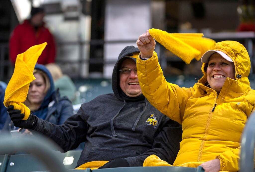 (Rick Egan | The Salt Lake Tribune)  Brian and Jenny Kiester cheer for the Salt Lake Bees as they play the Reno Aces at Smith's Ballpark on Tuesday, April 18, 2023.
