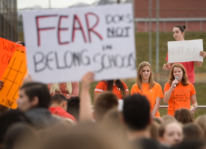 (Leah Hogsten  |  The Salt Lake Tribune) l-r Emma Glende and Ilona Wall joined their classmates in leading the protest in front of the school. East High School students Exactly one month after 17 people were killed at Marjory Stoneman Douglas High School in Parkland, survivors of the massacre joined tens of thousands of students across the United States by walking out of school, Wednesday, March 14, 2018. 