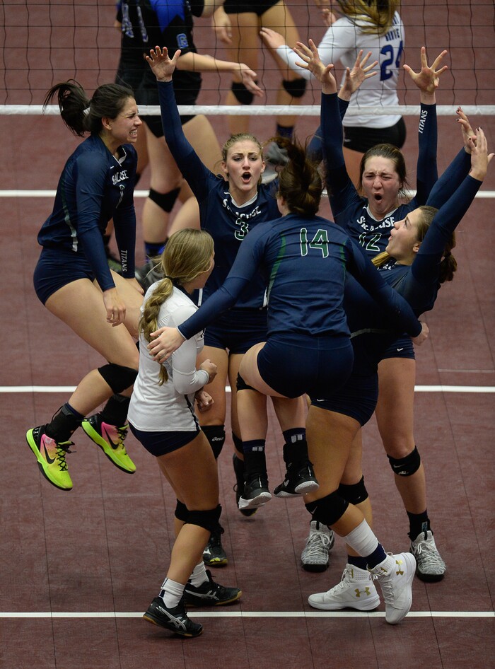 (Francisco Kjolseth  |  The Salt Lake Tribune)  Syracuse celebrates a point over Pleasant Grove in the quarterfinal match at the UCCU Center at Utah Valley University on Thursday, Nov. 2, 2017.  Pleasant Grove went on to win in three straight sets. 