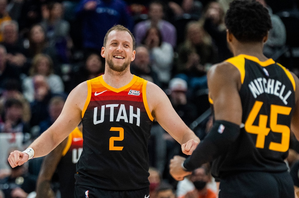 (Rick Egan | The Salt Lake Tribune) Utah Jazz guard Joe Ingles (2) celebrates with Donovan Mitchell (45) after Mitchell hit a big shot for the Jazz with 2:50 remaining the the game, in NBA action between the Utah Jazz and the Washington Wizards, at Vivint Arena on Saturday, Dec. 18, 2021.