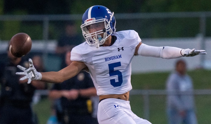 (Rick Egan | The Salt Lake Tribune)  Bingham wide receiver Brayden Bennett (5) tries to grab a pass, in prep football action between the Corner Canyon Chargers and the Bingham Miners, on Friday, Aug. 27, 2021.