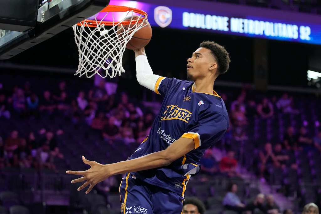(John Locher | The Associated Press) Boulogne-Levallois Metropolitans 92's Victor Wembanyama warms up before an exhibition basketball game against the NBA G League Ignite, Tuesday, Oct. 4, 2022, in Henderson, Nev.