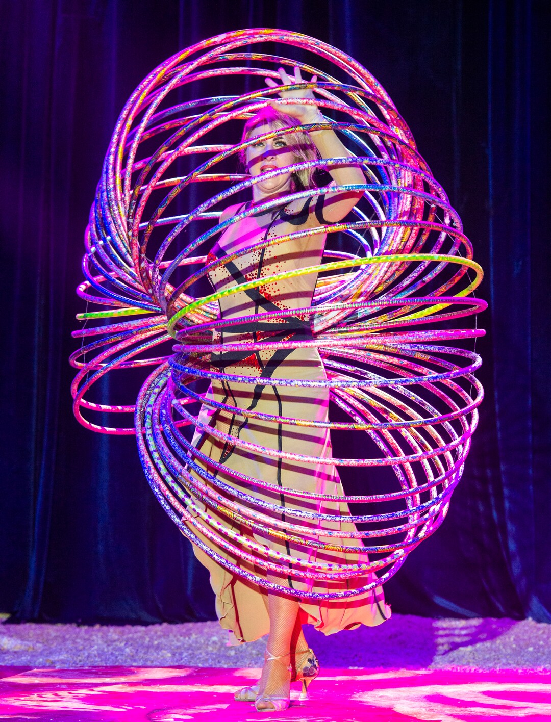 (Rick Egan  |  The Salt Lake Tribune)  Russian hula hoop artist ,Alesya Gulevich, performs at the Big Top Circus Spectacular, at the Utah State Fair, Sunday, Sept. 8, 2019.