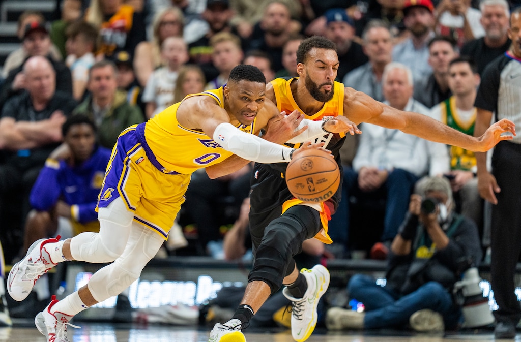 (Rick Egan | The Salt Lake Tribune) Utah Jazz center Rudy Gobert (27) goes for a loose ball along with Los Angeles Lakers guard Russell Westbrook (0), in NBA action between the Utah Jazz and the Los Angeles Lakers, at Vivint Arena, on Thursday, March 31, 2022.