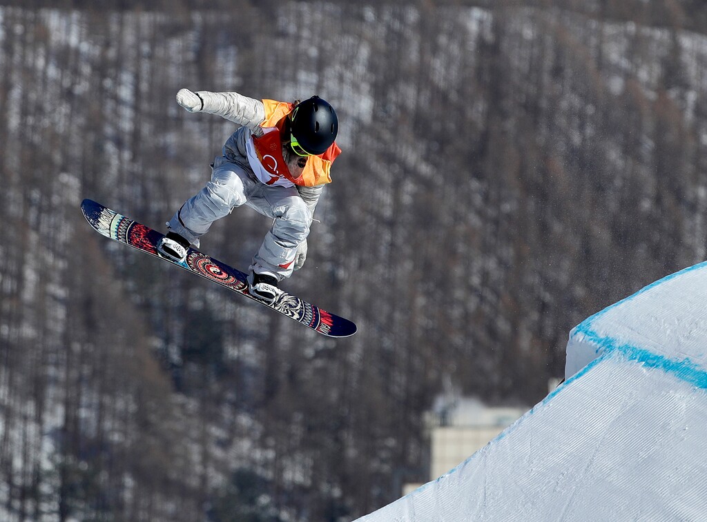 Jamie Anderson, of the United States, jumps during the women's slopestyle final at Phoenix Snow Park at the 2018 Winter Olympics in Pyeongchang, South Korea, Monday, Feb. 12, 2018. (AP Photo/Gregory Bull)