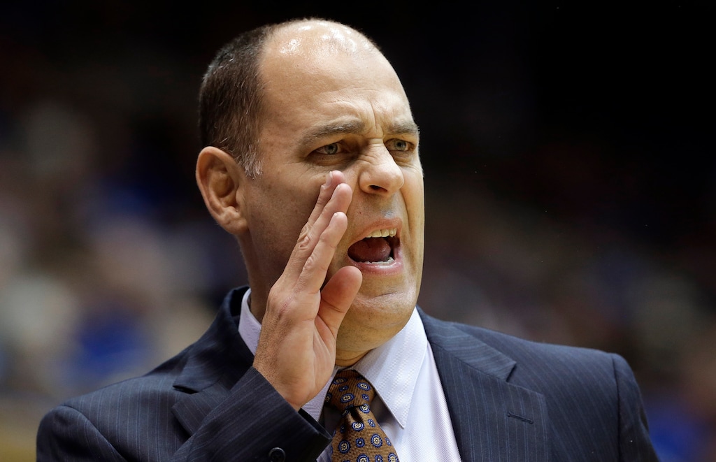 Utah coach Tim Duryea directs his team during the first half of an NCAA college basketball game against Duke in Durham, N.C., Sunday, Nov. 29, 2015. (AP Photo/Gerry Broome)