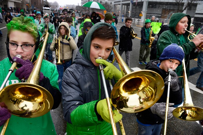 (Scott Sommerdorf | The Salt Lake Tribune) Players in the Salt Lake City School District elementary music program march during the 40th annual Salt Lake City St. Patrick's Day Parade on Saturday, March 17, 2018.