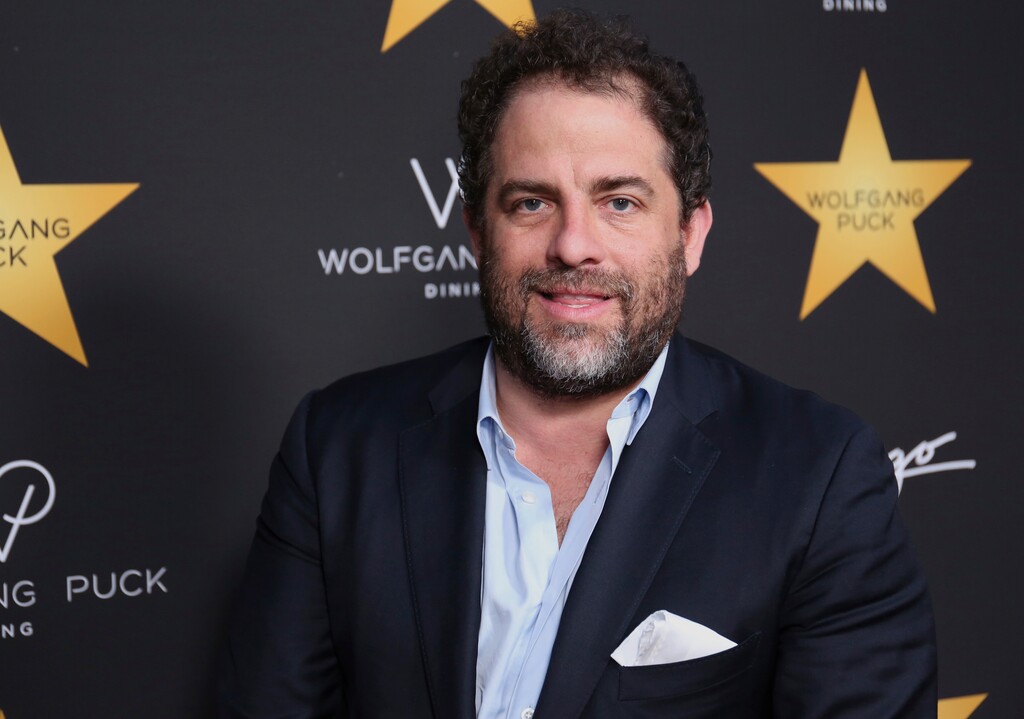 FILE - In this April 26, 2017 file photo, Brett Ratner arrives at the Wolfgang Puck's Post-Hollywood Walk of Fame Star Ceremony Celebration in Beverly Hills, Calif.  Hollywood's widening sexual harassment crisis ensnared another prominent film director when six women, Including actress Olivia Munn, accused Ratner of harassment or misconduct in a Los Angeles Times report, on Wednesday, Nov. 1. (Photo by Willy Sanjuan/Invision/AP, File)