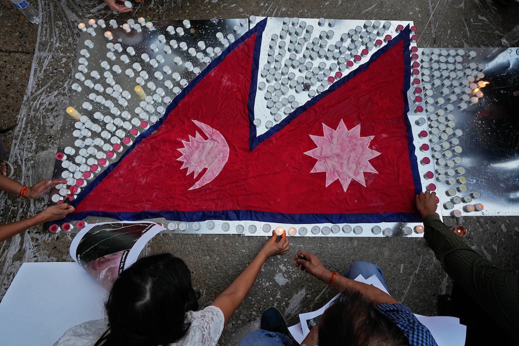 (Francisco Kjolseth | The Salt Lake Tribune) The Nepalese Association of Utah hosts a community candlelight vigil at City Hall in Salt Lake City for victims and missing persons from flooding that occurred in Nepal this week on Friday, August. 28, 2026.