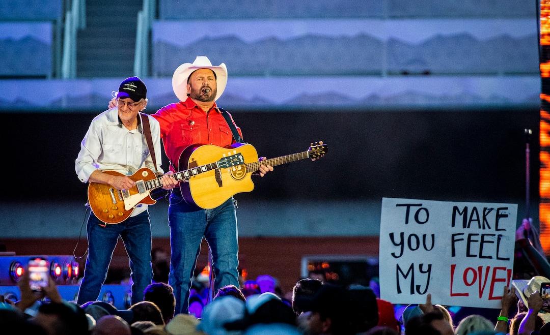 (Isaac Hale | Special to The Tribune) Garth Brooks performs with his band during a stop on their stadium tour held at Rice-Eccles Stadium in Salt Lake City on Saturday, July 17, 2021.