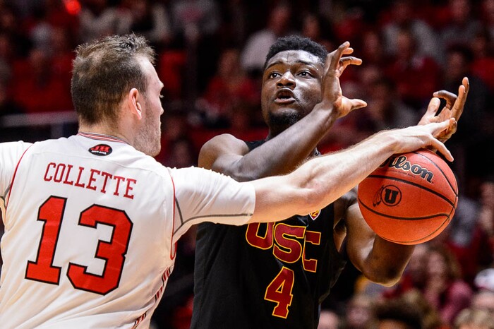(Trent Nelson | The Salt Lake Tribune)  Utah Utes forward David Collette (13) knocks the ball from USC Trojans forward Chimezie Metu (4) as the University of Utah hosts USC, NCAA basketball at the Huntsman Center in Salt Lake City, Saturday Feb. 24, 2018.