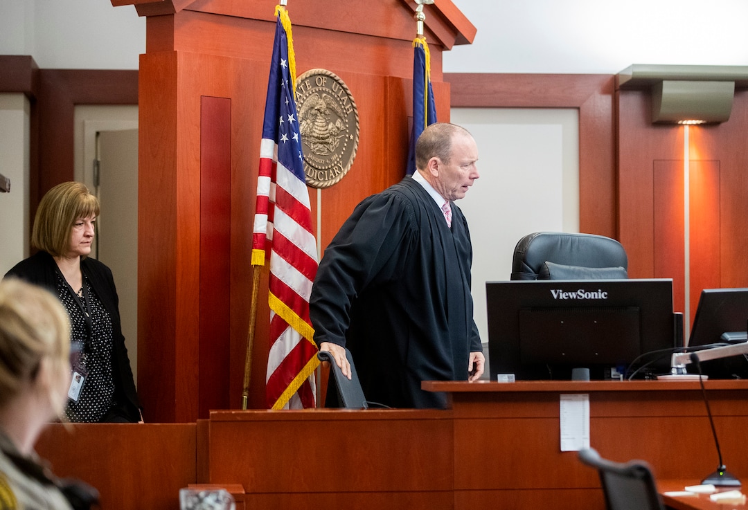 (Scott G Winterton  |  Deseret News/Pool) Juvenile Judge Renee Jiminez sits in with Judge Paul B. Parker on Friday, Dec. 13, 2019. Utah's juvenile judges will soon begin taking on cases in adult court, a move to help relieve crowded courtrooms in the state's most populated judicial district.