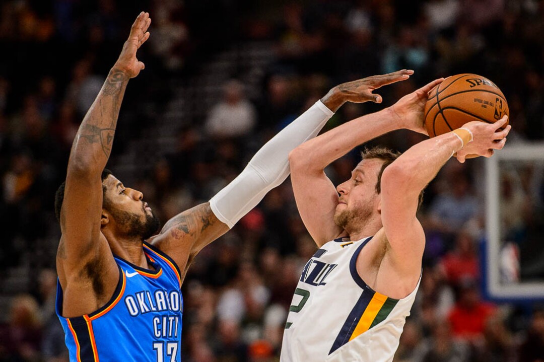 (Trent Nelson | The Salt Lake Tribune)  Oklahoma City Thunder forward Paul George (13) defending Utah Jazz forward Joe Ingles (2) as the Utah Jazz host the Oklahoma City Thunder, NBA basketball in Salt Lake City, Saturday December 23, 2017.
