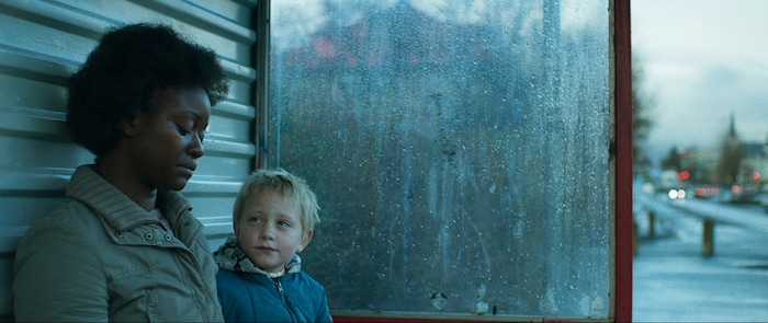 (Ita Zbroniec-Zaj  |  courtesy Sundance Institute) An asylum seeker from Guinea-Bissau (Babetida Sadjo, left, with Patrik Nökkvi Pétursson) is one of the characters of  Ísold Uggadóttir's "And Breathe Normally," which will screen in the World Cinema Dramatic competition of the 2018 Sundance Film Festival.