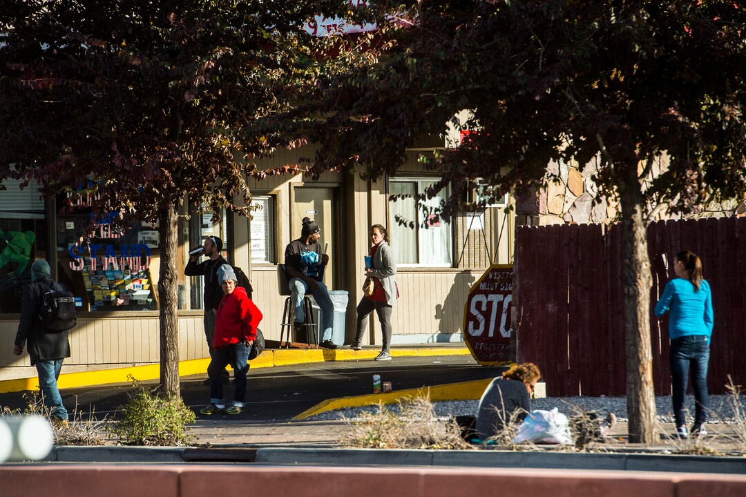 (Chris Detrick  |  The Salt Lake Tribune)  People outside of Gateway Inn 819 West North Temple in Salt Lake City Tuesday, October 17, 2017. 