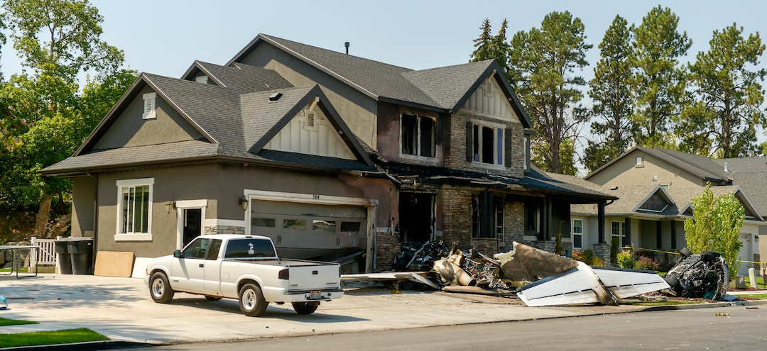 Leah Hogsten  |  The Salt Lake Tribune   The  house at 584 E. East Canyon Road in Payson where Duane "Rhedd" Youd, 47, crashed a plane about 2:30 a.m., Monday, August 13, 2018. Firefighters arrived to find the home engulfed in flames. The two people inside the home escaped through the back of the home and were uninjured. Youd had been booked into the Utah County Jail about 7:30 p.m. Sunday after being suspected of assaulting his wife. He bailed out of jail; returned to the home with a police officer about midnight to retrieve belongings and his truck; and left without incident.