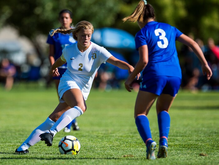 (Chris Detrick | The Salt Lake Tribune) Davis' Tabitha Howard (2) and Fremont's Kaitlyn Nelson (3) go for the ball during the game at Angel Street Soccer Complex in Kaysville Thursday, August 24, 2017. Fremont defeated Davis 5-4 in double overtime.