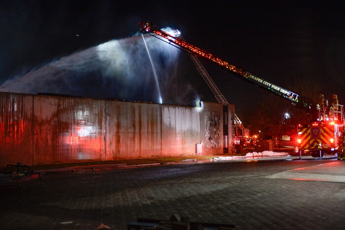 (Francisco Kjolseth | The Salt Lake Tribune) Crews from multiple agencies battled a fire Sunday night that broke out at South Valley Specialties at 9320 S. 547 West in Sandy. The building, where the company makes custom rubber moldings and other products, was declared a complete loss. The cause of the blaze is under investigation.