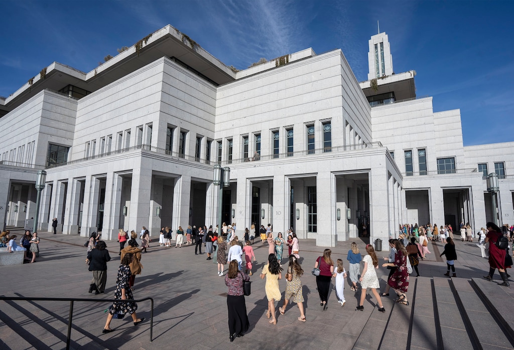 (Rick Egan | The Salt Lake Tribune)  Latter-day Saint faithful walk to the Conference Center for the women's session of General Conference on Saturday, April 2, 2022.