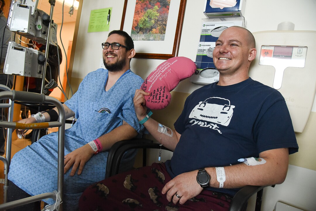(Francisco Kjolseth  |  The Salt Lake Tribune)  Mitchell Salas, left, poses for a photograph with Matthew Thompson holding up a stuffed kidney after the two met for the first time following their transplant surgery at Intermountain Medical Center in Murray earlier this week. The two Utah men met for the first time after Thompson generously donated his kidney to the other as a Good Samaritan organ donation on Friday, March 29, 2019. 