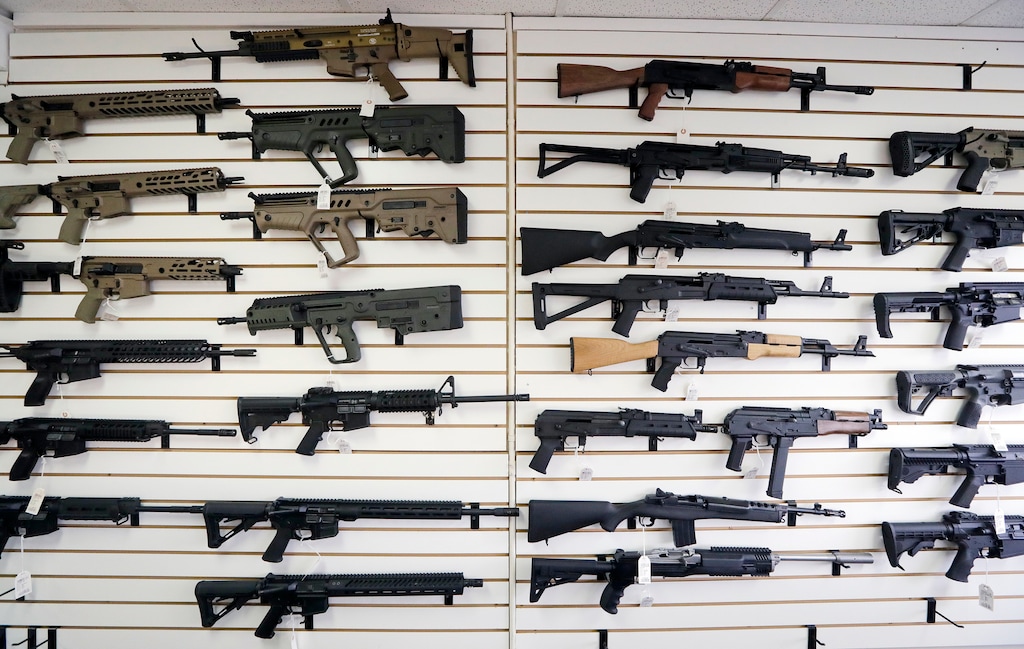 (Elaine Thompson | AP) Rifles fill a gun shop wall in Washington state in 2018. Latter-day Saint leaders have condemned violence in the wake of the Charlie Kirk shooting. They have not called for any action on gun legislation.