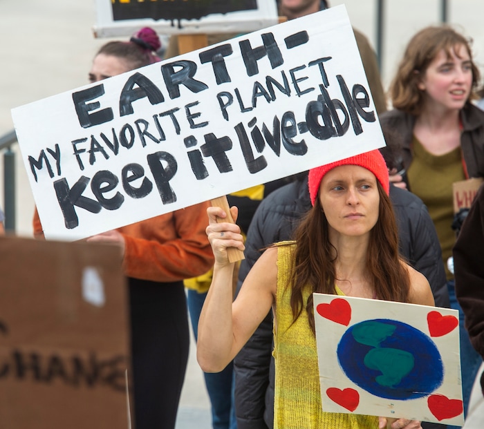 (Rick Egan  |  The Salt Lake Tribune)      
Ocea Wraye joins hundreds of students from around the state chant and sing as they march up State Street to the Utah State Capitol Building, demanding action on the climate crisis. Friday, Sept. 20, 2019.