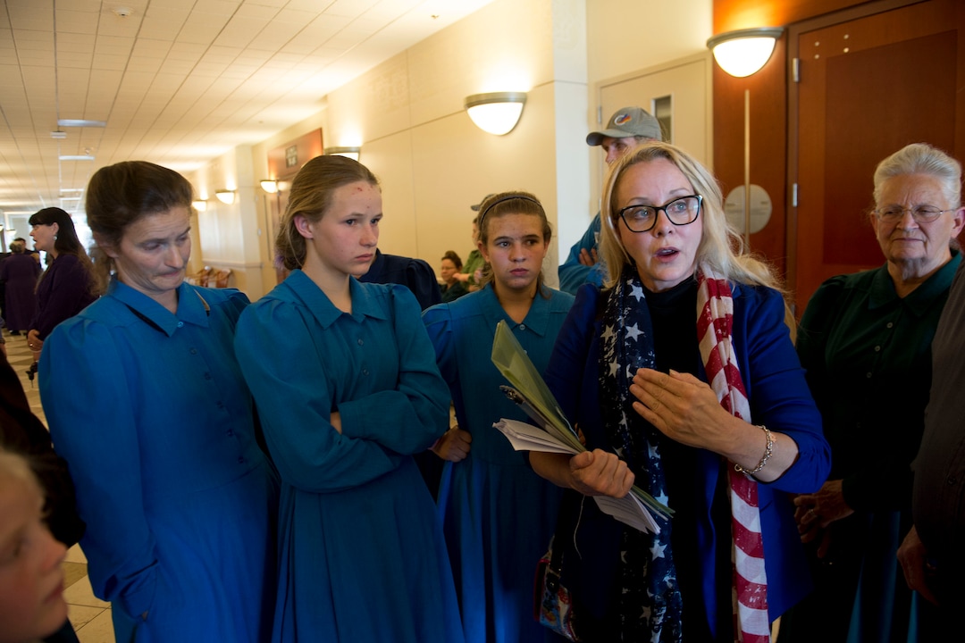 (Jeremy Harmon  |  The Salt Lake Tribune) Flanked by FLDS women, advocate Christine Katas speaks to media following a UEP hearing in Salt Lake City on Tuesday, June 18, 2019. Christine Katas