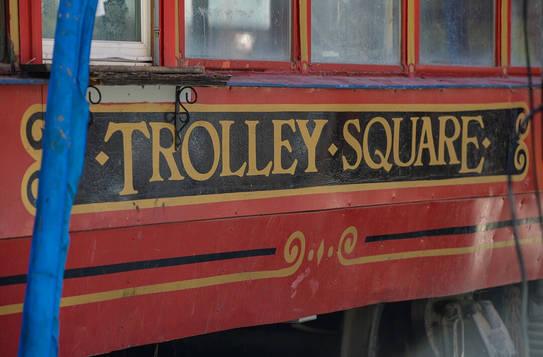 (Francisco Kjolseth  |  The Salt Lake Tribune)  The iconic trolley car, that has been sitting in storage for several years, is moved back into view at Trolley Square on Monday, Oct. 15, 2018. The empty trolley car, last seen housing the Trolley Wing Company was moved into place on the north plaza by Pottery Barn.