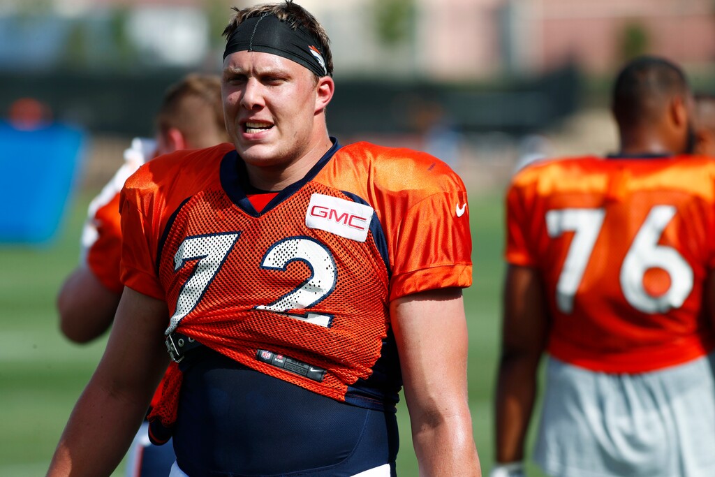 Denver Broncos offensive tackle Garett Bolles takes a break during drills at an NFL football training camp, Sunday, July 30, 2017, in Englewood, Colo. (AP Photo/David Zalubowski)
