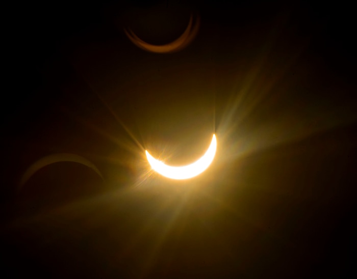 (Steve Griffin  |  The Salt Lake Tribune) Meadowlark Elementary School students watch The Great Eclipse during the Salt Lake School District's first day of the 2017-2018 school year. STEAM teacher-coordinator Wendi Laurence who formerly worked at NASA has been planning an event around the eclipse. All students had glasses to view the event and many had lunch outside at the Salt Lake City school Monday August 21, 2017.
