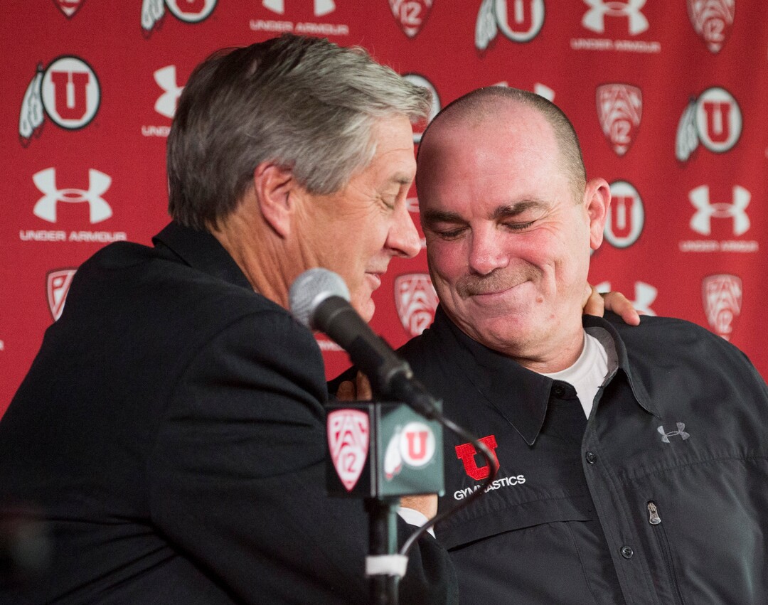 (Rick Egan  |  Tribune File Photo)  Utah athletic director Chris Hill hugs Greg Marsden, after a news conference at the Huntsman Center, Tuesday, April 21, 2015.