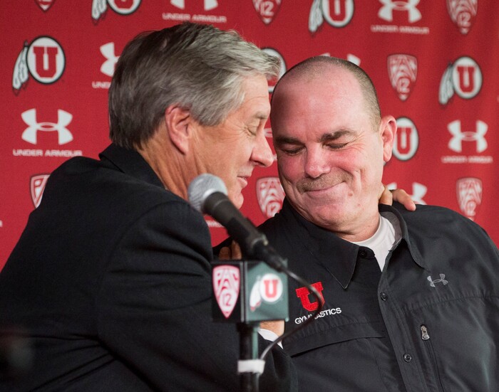 (Rick Egan  |  Tribune File Photo)  Utah athletic director Chris Hill hugs Greg Marsden, after a news conference at the Huntsman Center, Tuesday, April 21, 2015.
