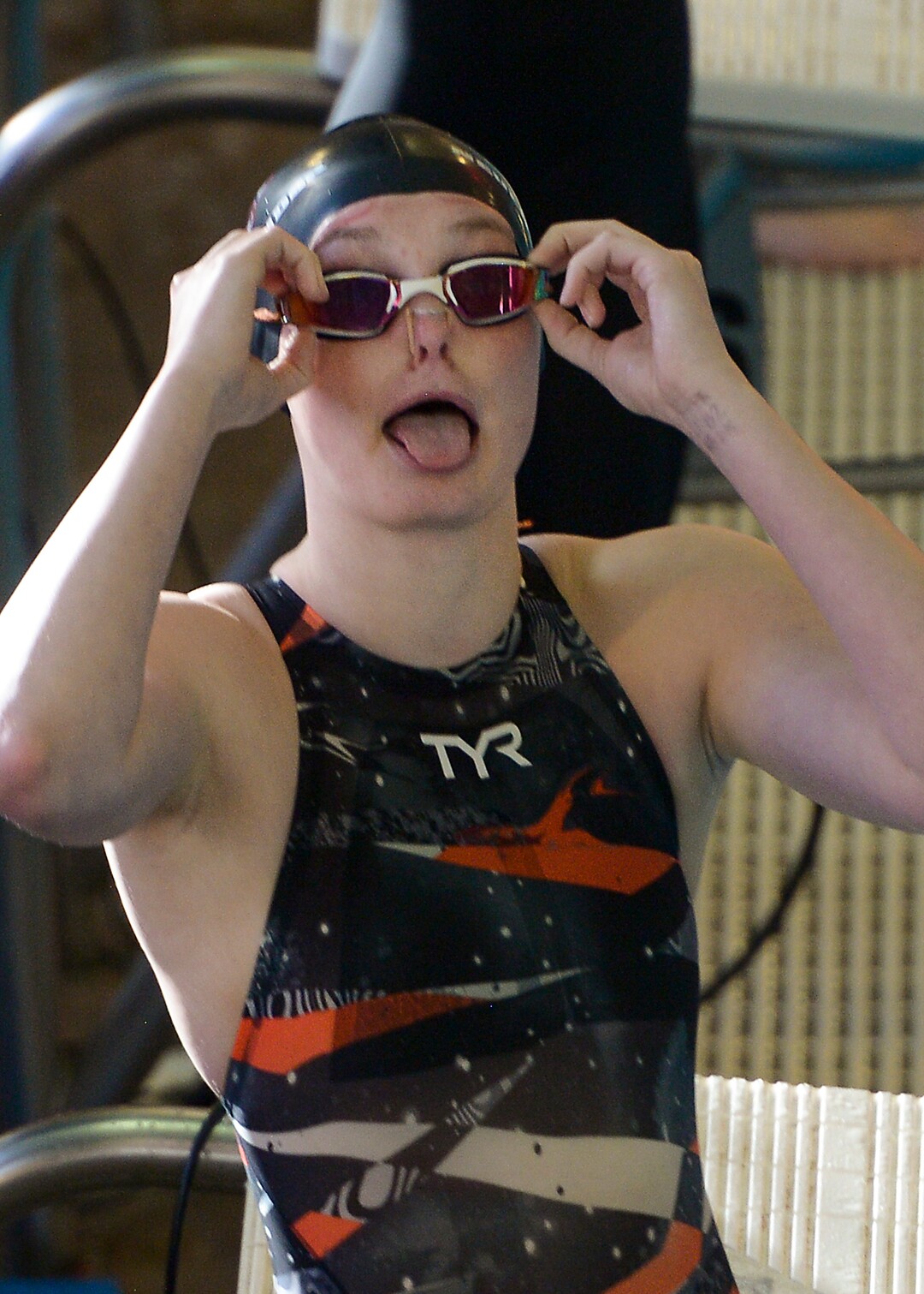 (Leah Hogsten  |  The Salt Lake Tribune)  Woods Cross High School's Amber Neuenschwander swam the 100 yard backstroke in 1:00.33 at the Class 5A State Championships in Bountiful, Saturday, February 10, 2018. 